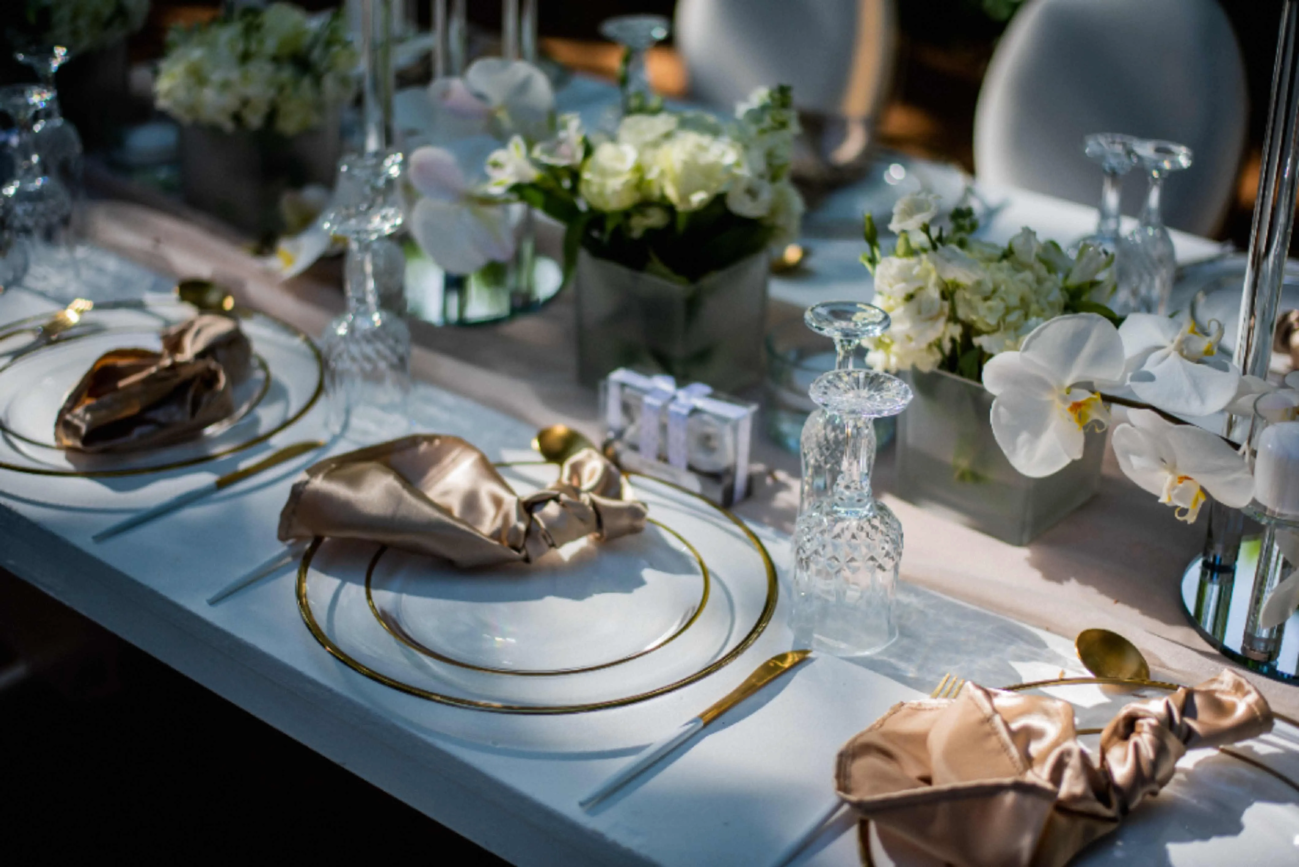 Gold and white wedding table setup and decor