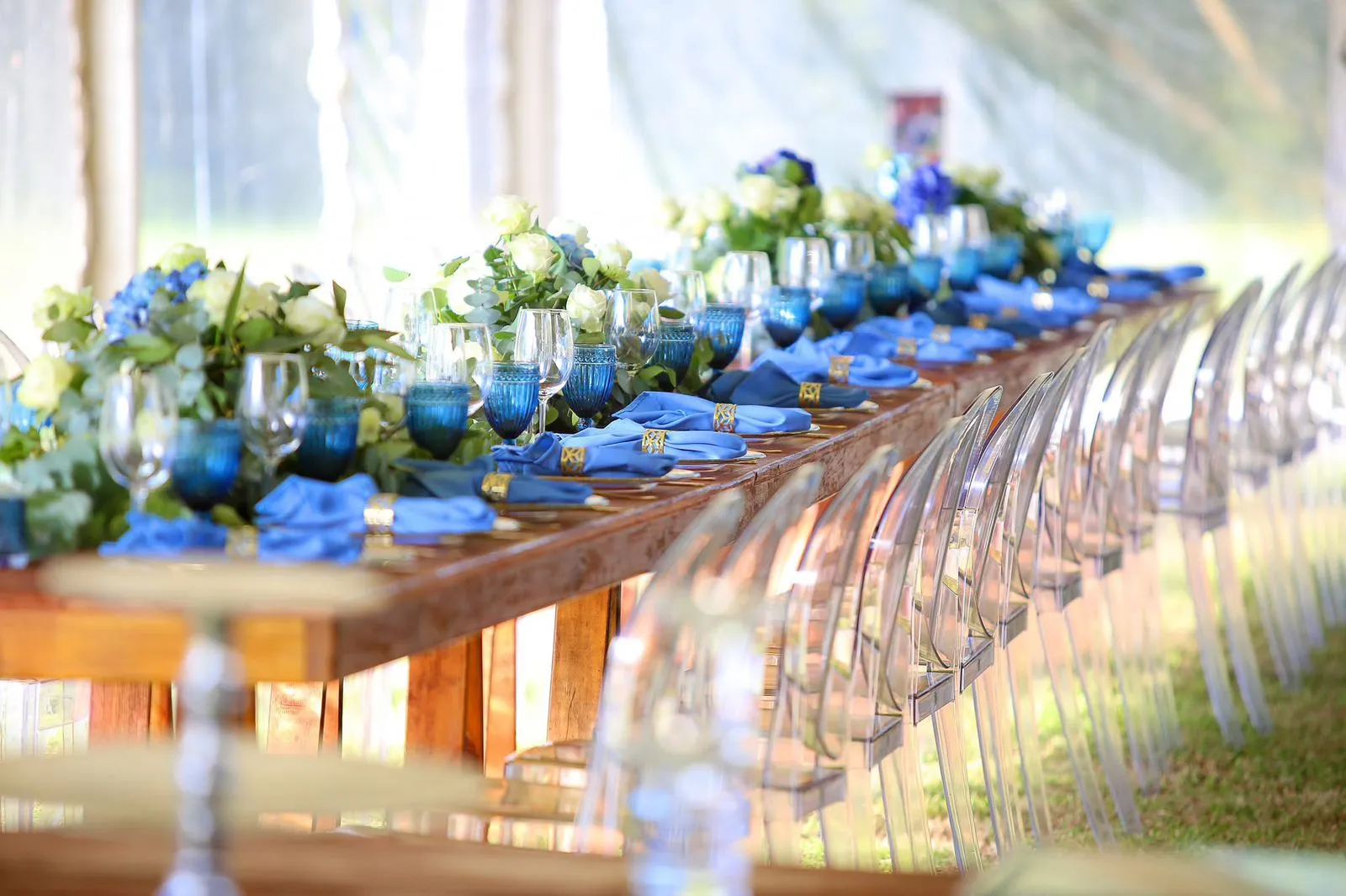 Luxury wedding decor with clear chairs